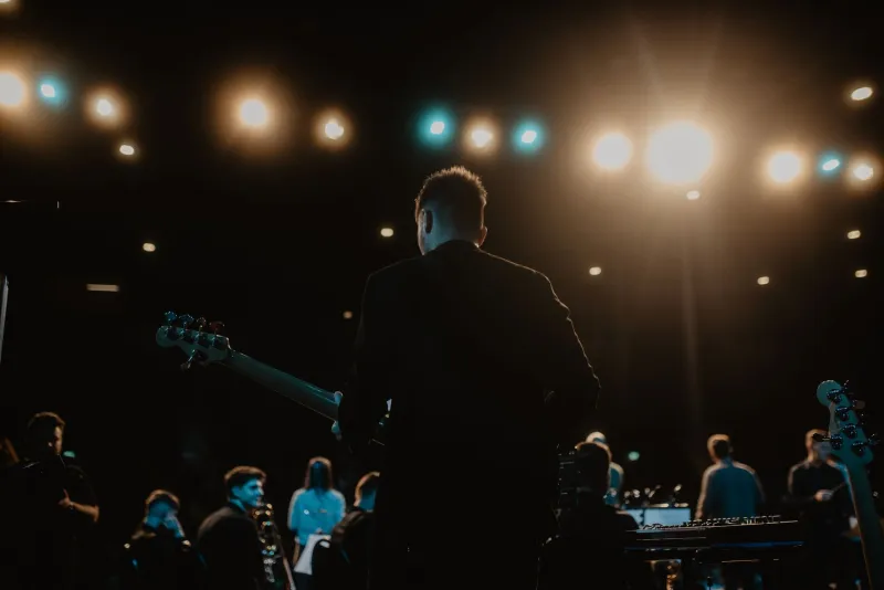 Controlled Chaos: What Really Goes Down Backstage When a Surprise Guest Blows Up a Headliner's Setlist